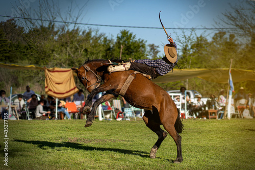 Sport of Argentine culture. Dressage of horses. Typical clothing of the gauchos. Gaucho culture.	