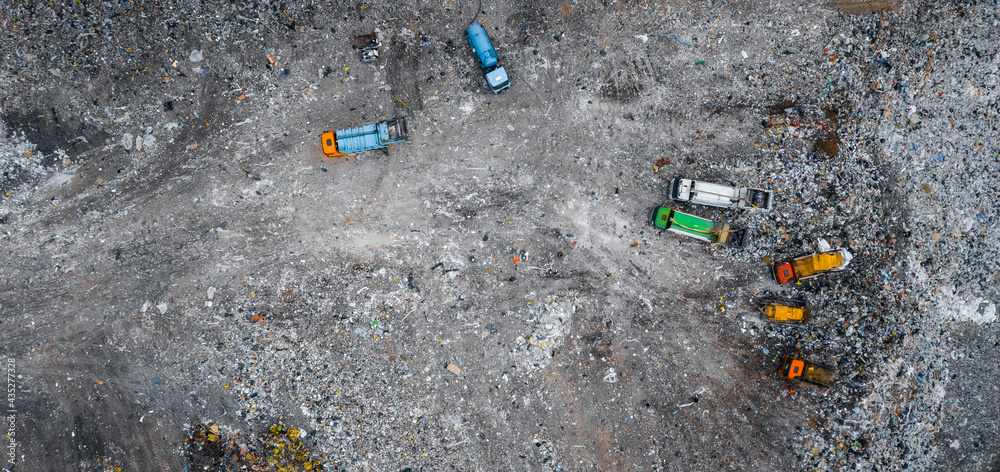 Obraz premium Waste garbage dump household pile trash, aerial top view landfill background. Concept environmental struggle with plastic pollution banner