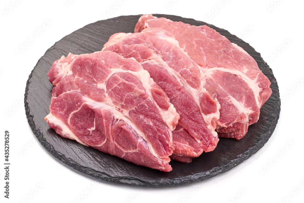 Pork steaks, isolated on a white background. High resolution image. Pork steaks, isolated on a white background. High resolution image.