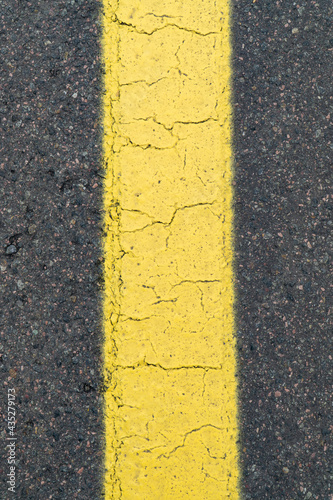 yellow markings on the asphalt