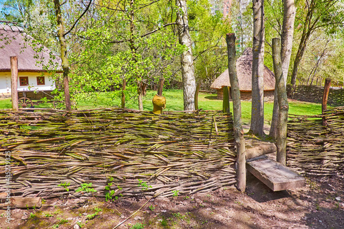 The estate behind the old wicker fence, Mamajeva Sloboda Cossack Village, Kyiv, Ukraine photo