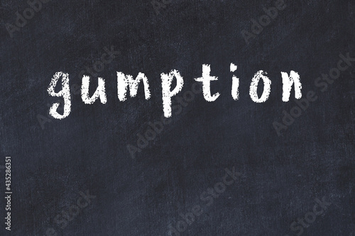 Fotografia College chalk desk with the word gumption written on in