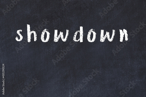 Fényképezés Black chalkboard with inscription showdown on in