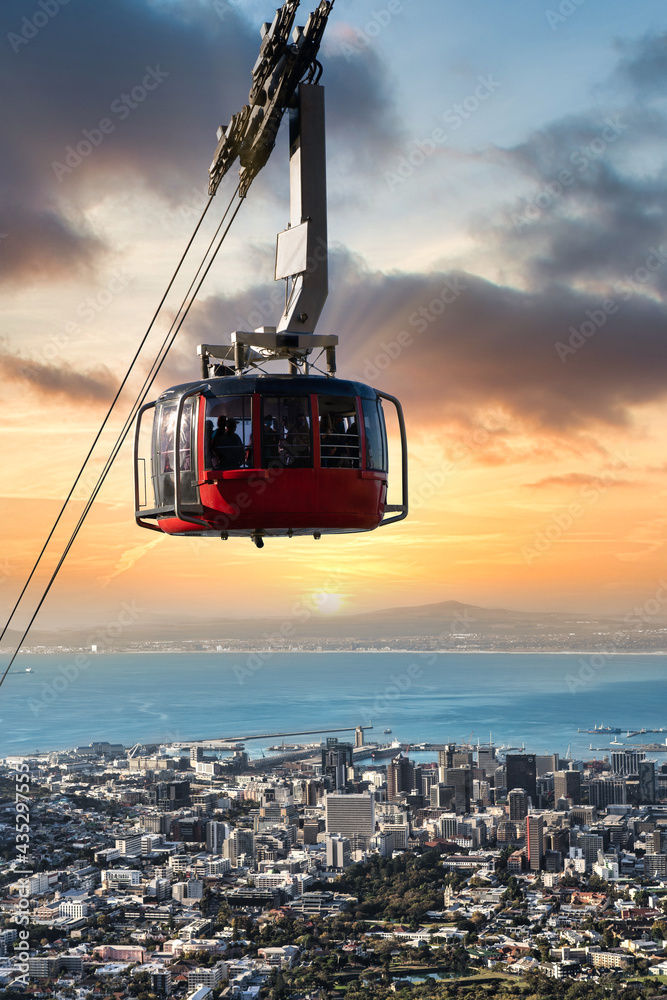 Naklejka premium Table Mountain cable car looking over Cape Town city bowl and the Atlantic Ocean - Great outdoors adventure and travel holiday destination, Cape Town, South Africa