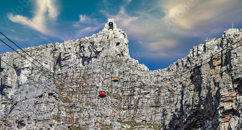 Table Mountain cable cars with a view towards the top cable way station - Great outdoors adventure and travel holiday destination, Cape Town, South Africa photo