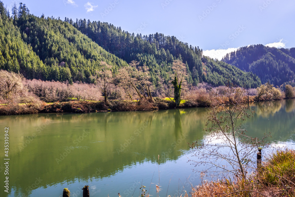 Suislaw river in beautiful sunny day. Oregon, USA Suislaw river in beautiful sunny day. Oregon, USA