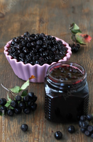 Chokeberry jam, berries in sugar syrup Aronia, Black chokeberry. canning berries for the winter,