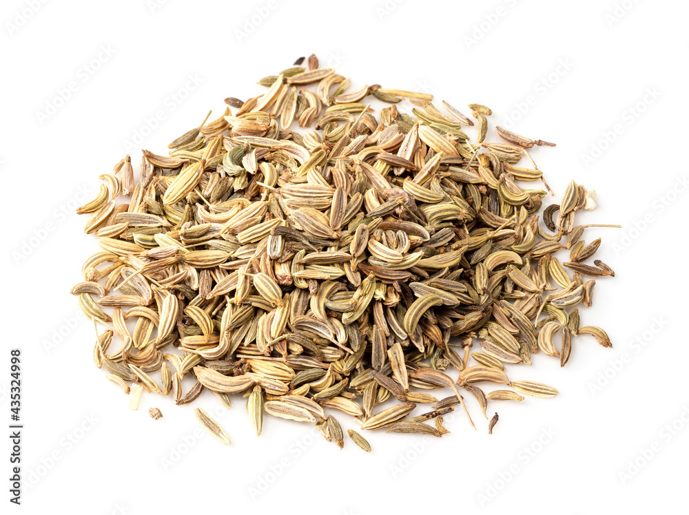 handful of Fennel fruits closeup on white