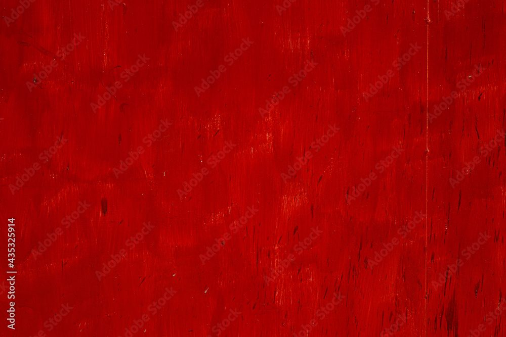 A red painted iron gate with a nice rustic texture and rich color. A red painted iron gate with a nice rustic texture and rich color.