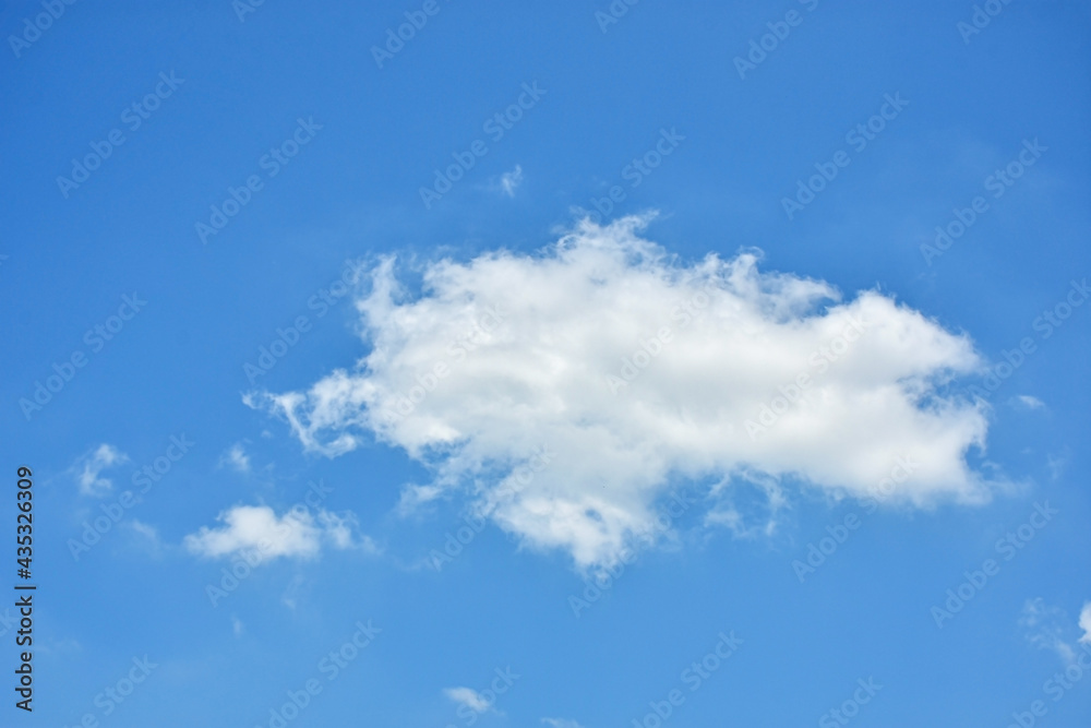 Beautiful cumulus clouds against the blue daytime sky. Beautiful cumulus clouds against the blue daytime sky.