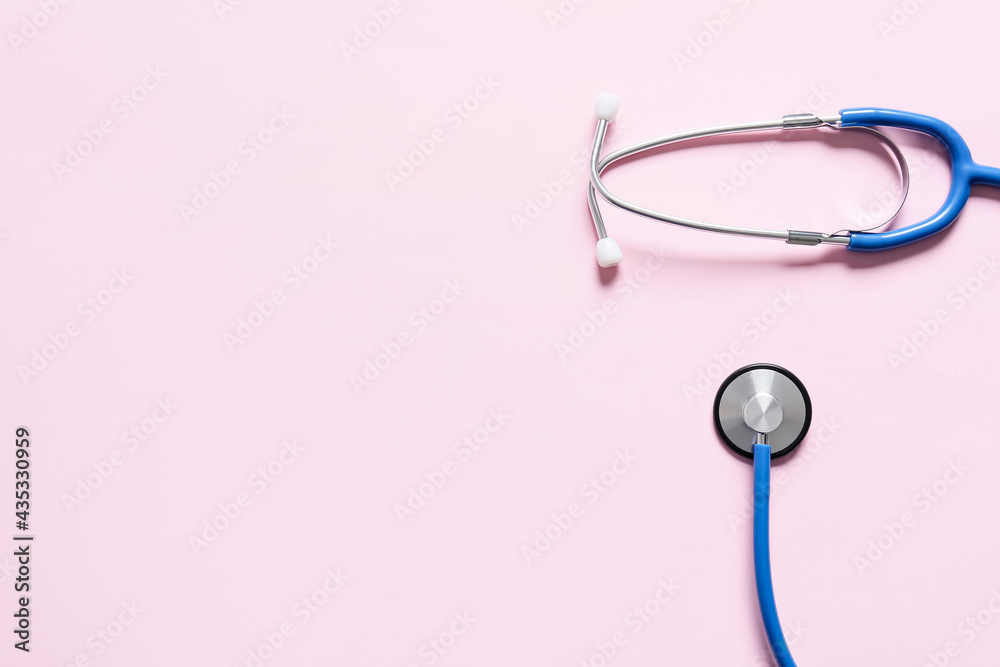 Modern stethoscope on color background Modern stethoscope on color background