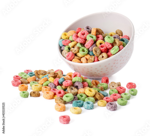Bowl with cereal rings on white background