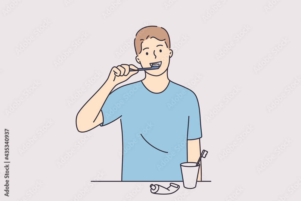 Dental hygiene and health concept. Young positive man cartoon character standing and cleaning teeth woth toothbrush and paste in bathroom vector illustration Dental hygiene and health concept. Young positive man cartoon character standing and cleaning teeth woth toothbrush and paste in bathroom vector illustration