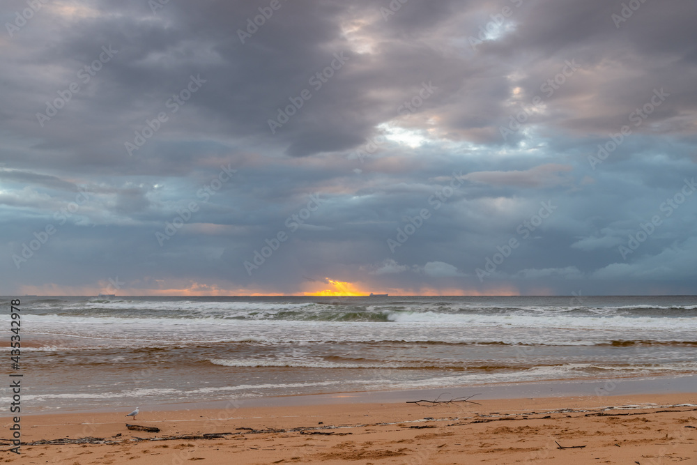 Fototapeta premium Rainy day sunrise at the lagoon