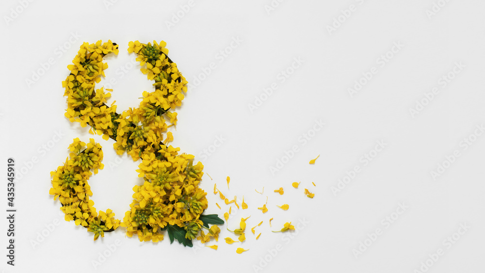 Banner, Greeting card March 8. The number eight is cut into the paper and filled with yellow flowers. international Women's Day