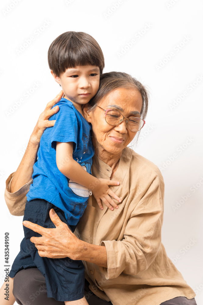 Portrait of happy Asian grandparents and grandson on white background, old senior retired people and child. Portrait of happy Asian grandparents and grandson on white background, old senior retired people and child.