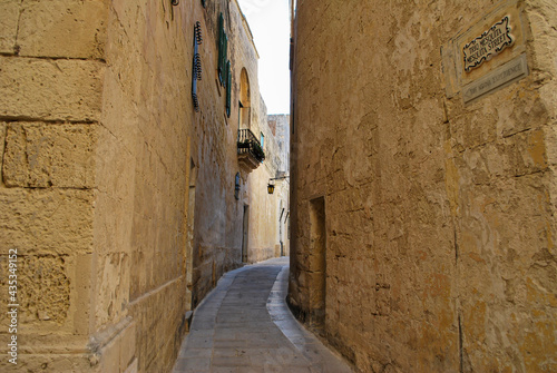 narrow street in the town © toKLabo