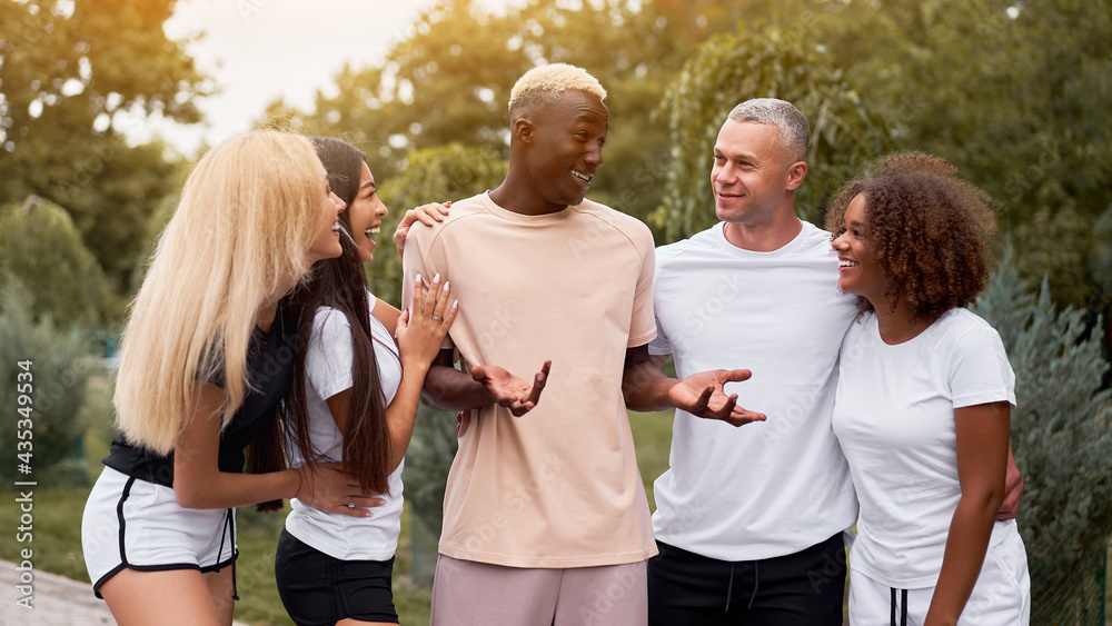 Fototapeta premium Multi-ethnic group people teenage friends. African-american, asian, caucasian student spending time together Multiracial friendship