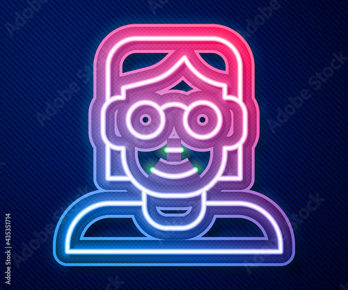 Glowing neon line Hacker or coder icon isolated on blue background. Programmer developer working on code, coding, testing, debugging, analysing. Vector