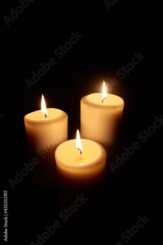 three burning candles