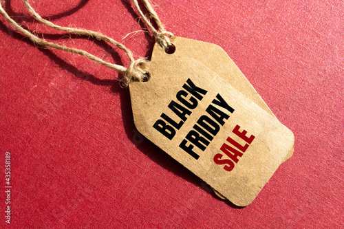 Black Friday. Sale tag on the red background