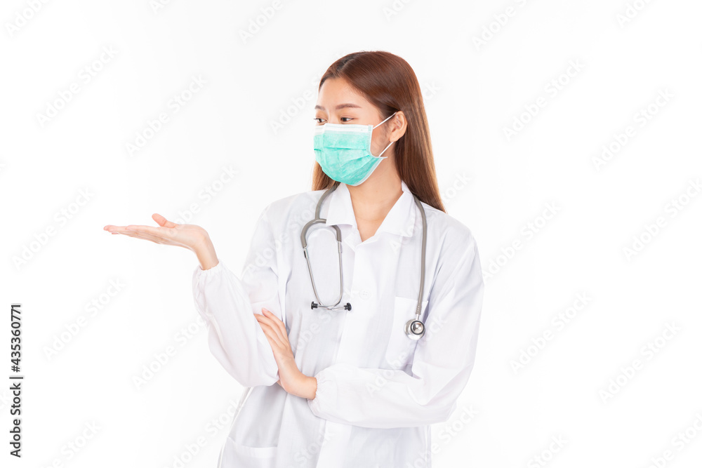 Young Asian female doctor on white background. Casual Asian woman wearing surgical mask, corona virus (Covid-19) prevention. Casual Asian woman wearing doctor gown on white background. Young Asian female doctor on white background. Casual Asian woman wearing surgical mask, corona virus (Covid-19) prevention. Casual Asian woman wearing doctor gown on white background.