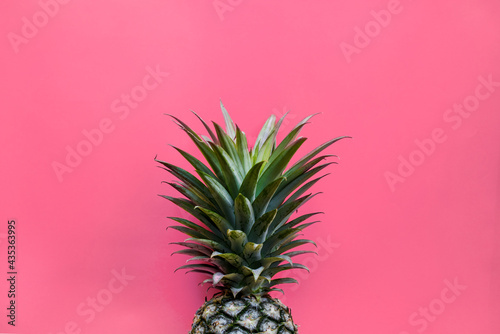 Pineapple with pink background