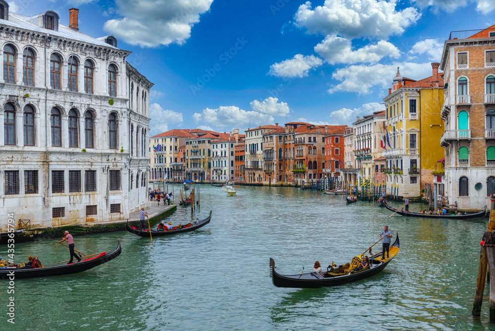 Grand Canal with gondola in Venice, Italy. Architecture and landmarks of Venice. Venice postcard