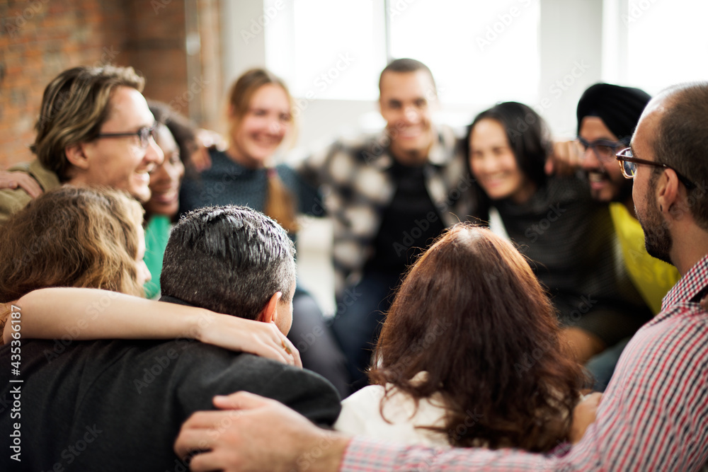 Community team doing a group hug