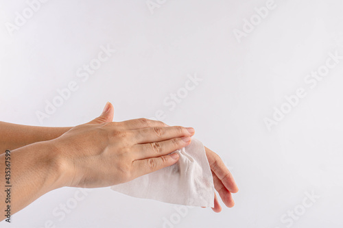 Hand woman drying hands with paper Isolated on white background