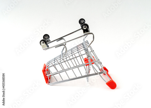 Supermarket shopping cart isolated on white background.
