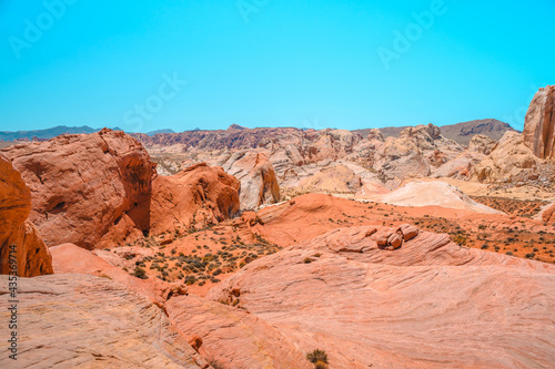 Valley of Fire National Park in Nevada. Orange amazing landscape, stones of different shapes and a fire wave