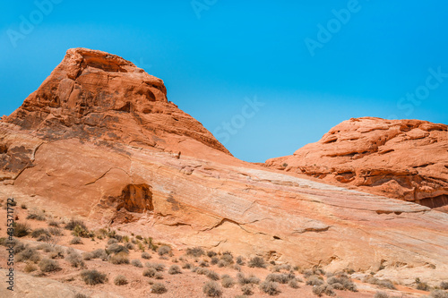 Valley of Fire National Park in Nevada. Orange amazing landscape  stones of different shapes and a fire wave