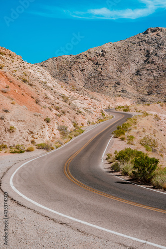 Panorama of the road in the Valley of Fire Park in Nevada. Amazing scenery on the road between the orange rocks © KseniaJoyg