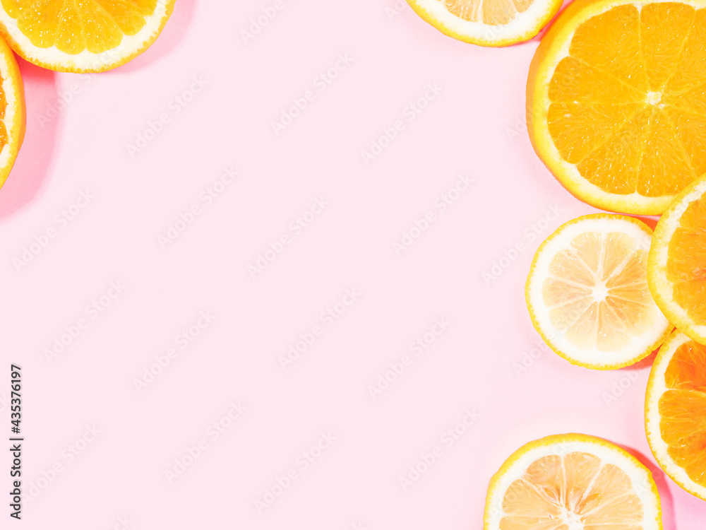 Colorful orange citrus slice fruit texture background on pastel pink