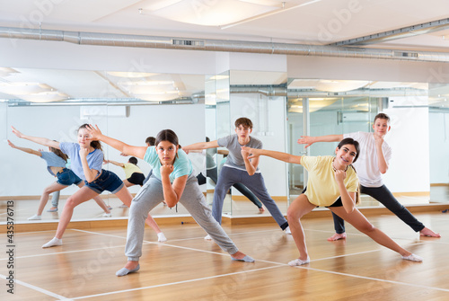 Active teens learn new dance moves in dance studio