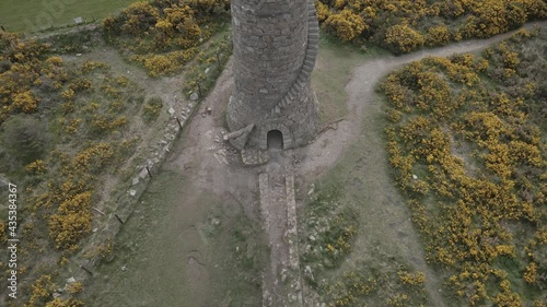 The Ruin Of The Flue Chimney At Ballycorus Leadmines In Carrickgollogan Park Near Dublin City In Ireland - aerial drone shot photo