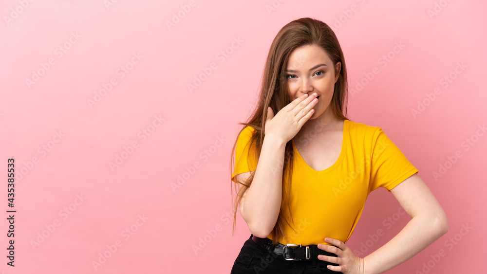 Teenager girl over isolated pink background happy and smiling covering mouth with hand Teenager girl over isolated pink background happy and smiling covering mouth with hand