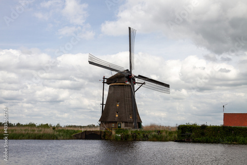 Windmill in nature at Kinderdijk,  Molenlanden, Netherlands
