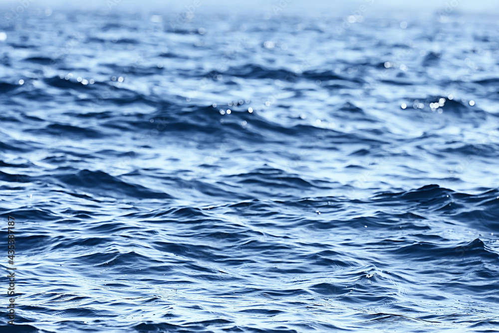 abstract background, texture sea blue water, waves and ripples on the ocean, sea pattern wallpaper abstract background, texture sea blue water, waves and ripples on the ocean, sea pattern wallpaper