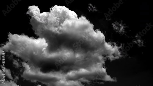 separate white clouds on a black background have real clouds. White cloud isolated on a black background realistic cloud.