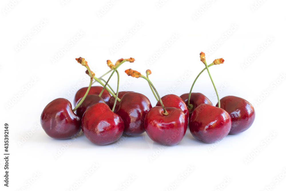 Handful of real cherries on white background Handful of real cherries on white background
