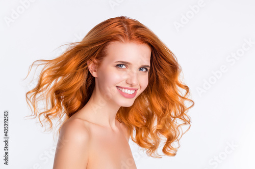 Принти на полотні Photo portrait of young woman with wavy red hair happy smiling with flying hair