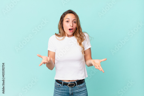 pretty woman amazed, shocked and astonished with an unbelievable surprise