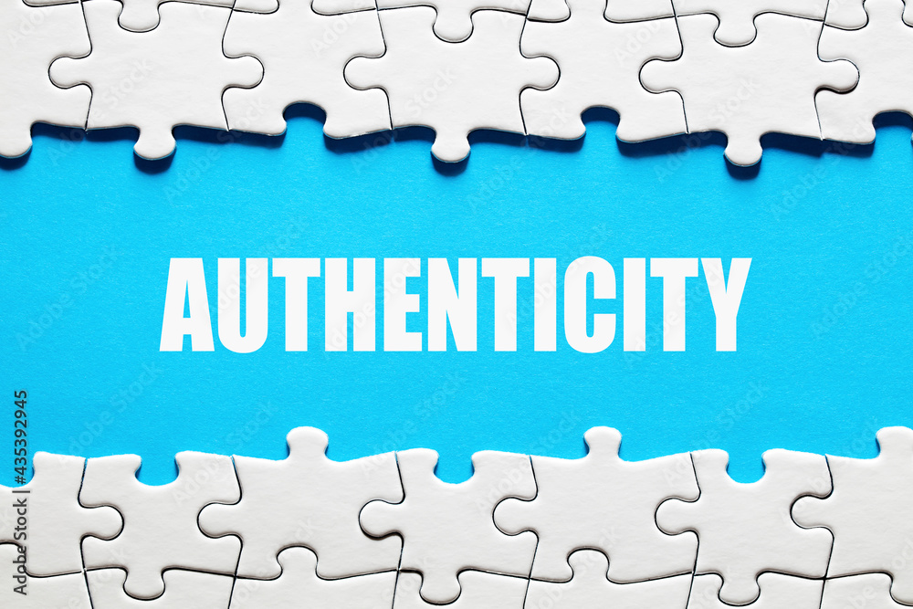 The word authenticity framed by jigsaw puzzle pieces. To discover or reveal the truth, reality or reliability The word authenticity framed by jigsaw puzzle pieces. To discover or reveal the truth, reality or reliability