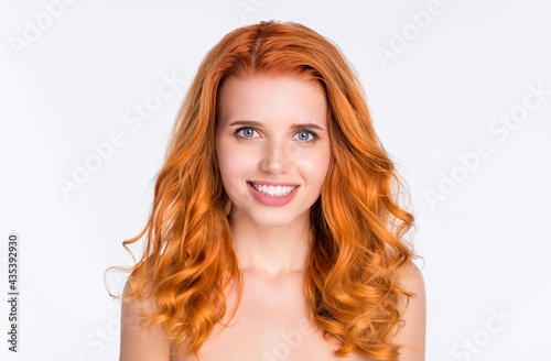 Photo portrait of young woman curly red hair smooth skin smiling naked shoulders isolated white color background