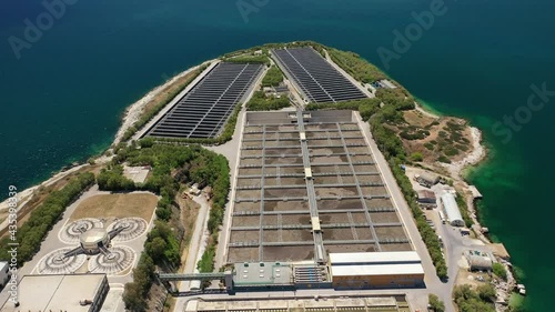 Aerial drone video of latest technology sewage and sludge processing plant in small island of Psitalia or Psyttaleia, Piraeus, Attica, Greece photo