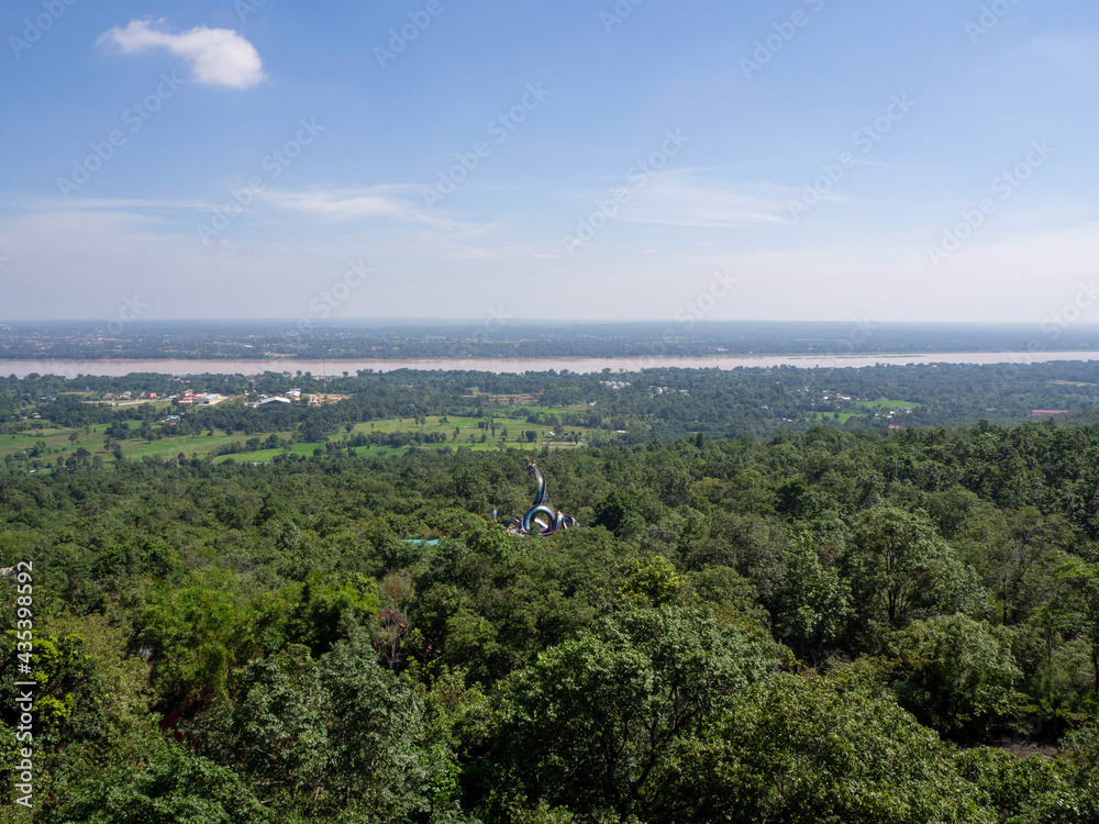 Obraz premium Amazing bird's-eye view mountain scenery of summer, blue sky, big Naga statue near .Mekong River in Thailand.