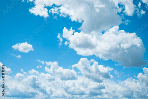 White clouds on the blue sky  background