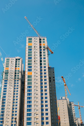 Wallpaper Mural Modern apartment building with crane on construction site Torontodigital.ca